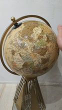 ギャラリービューアGlazed beige globe on a .gold stand WORLDに読み込んでビデオを見る
